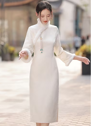 What does the white cheongsam stand for